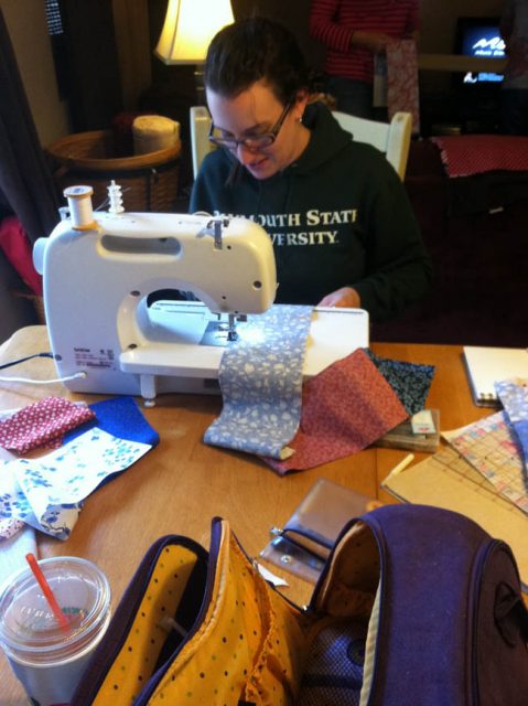 That's me manning the sewing machine. Looking at this photos I now know why my back/shoulders are achy 3 days later
