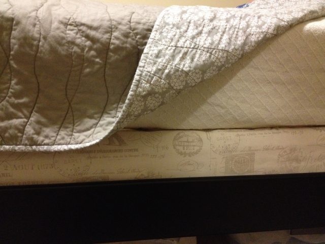 "Reupholstered" Box Spring - subtle but far classier than the ugly box spring fabric!