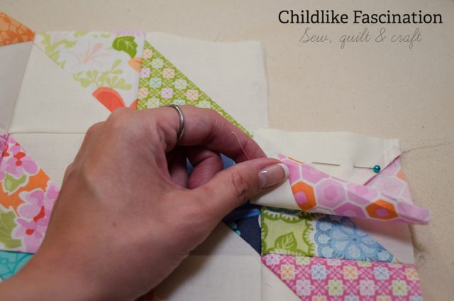 Sew the block to the side where the seam is cut extra