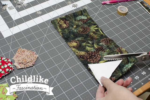 Cut out triangles of the green pine fabric