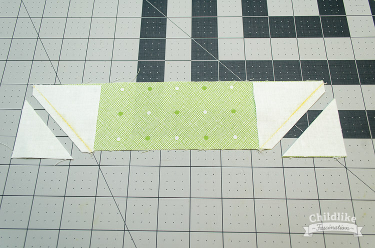 Sew along the marked line and trim corners off 1/4" away from seam
