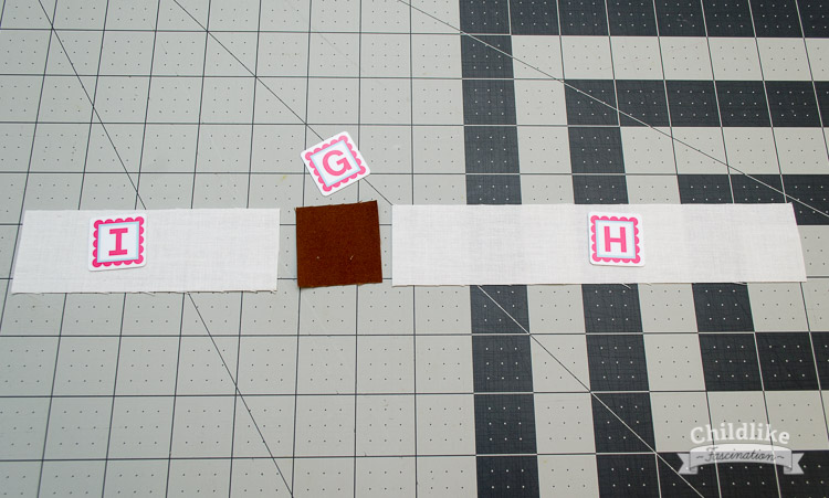 Sew the I and H pieces to opposite sides for the G block for the sailboat mast